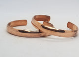 Copper bangels and chain bracelets